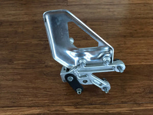 Aprilia RSV Tuono 1000 footpeg bracket left 2004-2009